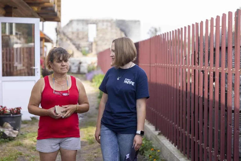 Julia meeting with a beneficiary in Ukraine